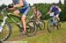 Laura Bietola gets caught in traffic with Cadet men  		CREDITS:   		TITLE: MTB XC Nationals  		COPYRIGHT: Rob Jones