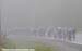It was a foggy start  		CREDITS:   		TITLE: Tour de Beauce  		COPYRIGHT: Rob Jones/www.canadiancyclist.com