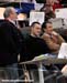 Former champion Arnaud Tournant watches the action from the press tribune