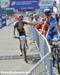 Burry Stander hands off 		CREDITS:  		TITLE: MTB World Championships 		COPYRIGHT: ROB JONES/CANADIAN CYCLIST.COM