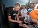 Tyder Hesjedal signs autographs 		CREDITS:  		TITLE: 2011 Tour de France 		COPYRIGHT: � Casey B. Gibson 2011