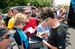 Miller signs autographs 		CREDITS:  		TITLE: 2011 Tour de France 		COPYRIGHT: CanadianCyclist.com