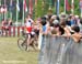 Plaxton had time to greet friends before crossing the finish line 		CREDITS:  		TITLE: MTB XC Nationals 		COPYRIGHT: Rob Jones/www.canadiancyclist.com 2011� All rights retained - no copying, printing or other manipulation, editing or processing permitted 