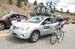 Jens Voight and the team car 		CREDITS:  		TITLE: USA Pro Cycling Challenge, 2011 		COPYRIGHT: © Canadian Cyclist 2011