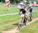 Premont and Nash battle for 4th 		CREDITS: Rob Jones 		TITLE: World Cup Mont Ste-Anne 		COPYRIGHT: Rob Jones/www.canadiancyclist.com 2011� All rights retained - no copying, printing or other manipulation, editing or processing permitted without prior, wri