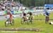 Ralph Naef (Multivan Merida Biking Team about to overtake Milan Spesny (S&H Superior MTB Team) in 1/8 Finals Heat 		CREDITS:  		TITLE: Nove Mesto Na Morave World Cup 		COPYRIGHT: Rob Jones/www.canadiancyclist.com 2011� All rights retained - no copying, pr