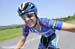 Andrew Pinfold decided to hitch a ride after his bike change 		CREDITS:  		TITLE: Tour de Beauce 		COPYRIGHT: Rob Jones/www.canadiancyclist.com 2011� All rights retained - no copying, printing or other manipulation, editing or processing permitted without