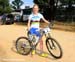 Catharine Pendrel shows off her matching rainbow kit 		CREDITS:  		TITLE: Pietermaritzburg World Cup 		COPYRIGHT: Rob Jones/www.canadiancyclist.com 2012� All rights retained - no use permitted without prior, written permission