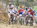 The bunch is moving FAST up the first climb 		CREDITS:  		TITLE: Houffalize World Cup 		COPYRIGHT: Rob Jones/www.canadiancyclist.com 2012� All rights retained - no use permitted without prior, written permission