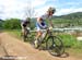 Catharine Pendrel (Luna Pro Team) and Gunn-Rita Dahle Flesjaa (Multivan Merida Biking Team) 		CREDITS:  		TITLE: La Bresse World Cup 		COPYRIGHT: Rob Jones/www.canadiancyclist.com 2012� All rights retained - no use permitted without prior, written permiss