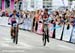 Evan Guthrie showboats as he crosses the line ahead of Grotts 		CREDITS:  		TITLE: La Bresse World Cup 		COPYRIGHT: Rob Jones/www.canadiancyclist.com 2012� All rights retained - no use permitted without prior, written permission