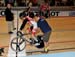 Coach Wooles holds Bell before start 		CREDITS:  		TITLE: 2012 Track World Championships, Melbourne 		COPYRIGHT: Rob Jones/www.canadiancyclist.com 2012� All rights retained - no use permitted without prior, written permission