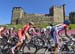 The first climb of the course took the riders past an 11th century Templar castle 		CREDITS:  		TITLE: 2014 Road World Championships Ponferrada Spain 		COPYRIGHT: Rob Jones/www.canadiancyclist.com 2014 -copyright -All rights retained - no use permitted wi