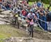 Batty clips back in after her near crash 		CREDITS:  		TITLE: 2018 La Bresse MTB World Cup 		COPYRIGHT: Rob Jones/www.canadiancyclist.com 2018 -copyright -All rights retained - no use permitted without prior; written permission