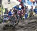 Mackenzie Myatt hits a stump at the wrong angle 		CREDITS:  		TITLE: 2018 MTB World Championships, Lenzerheide, Switzerland 		COPYRIGHT: Rob Jones/www.canadiancyclist.com 2018 -copyright -All rights retained - no use permitted without prior; written permi
