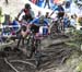 Mackenzie Myatt hits a stump at the wrong angle 		CREDITS:  		TITLE: 2018 MTB World Championships, Lenzerheide, Switzerland 		COPYRIGHT: Rob Jones/www.canadiancyclist.com 2018 -copyright -All rights retained - no use permitted without prior; written permi