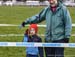 A young fan enjoys the racing 		CREDITS:  		TITLE: 2019 Cyclocross National Championships 		COPYRIGHT: Rob Jones/www.canadiancyclist.com 2019 -copyright -All rights retained - no use permitted without prior, written permission